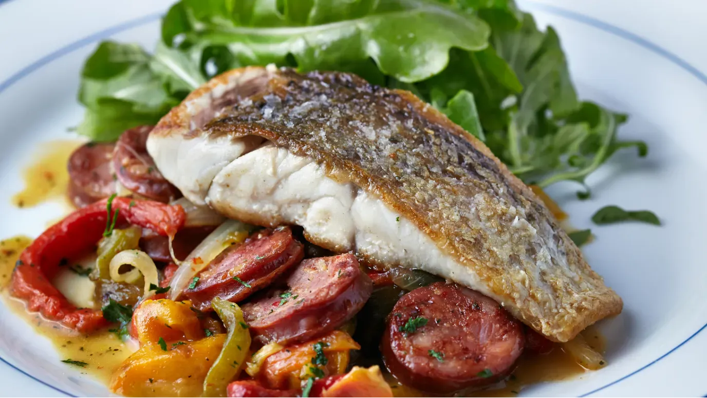 Crispy Skin Barramundi with Roasted Peppers Parsley and Chorizo