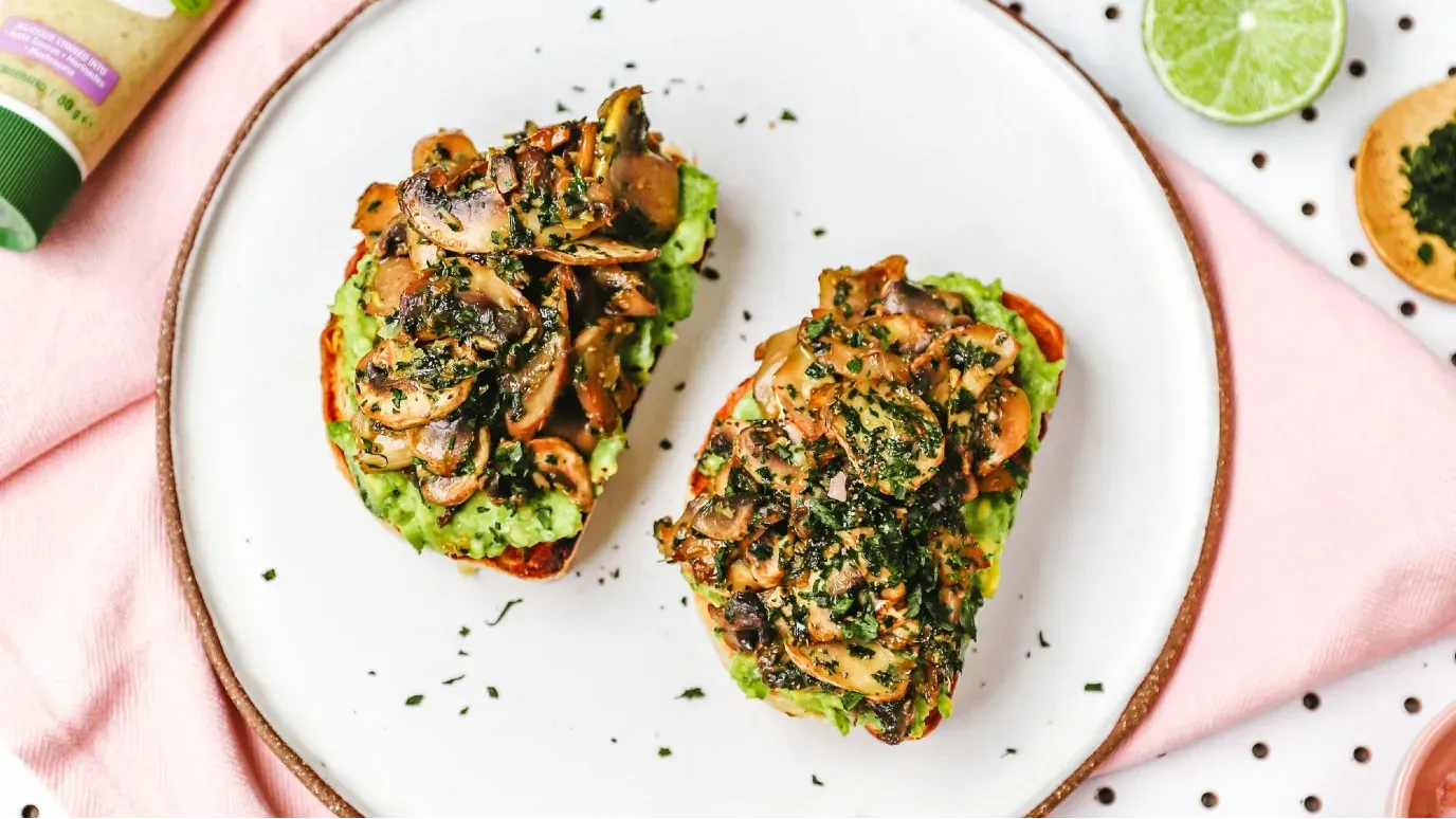 Sautéed Garlic Mushrooms on Smashed Avocado Toasts